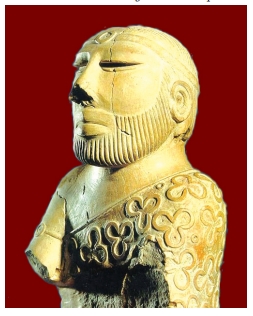 Stone Statue of Bearded Priest
